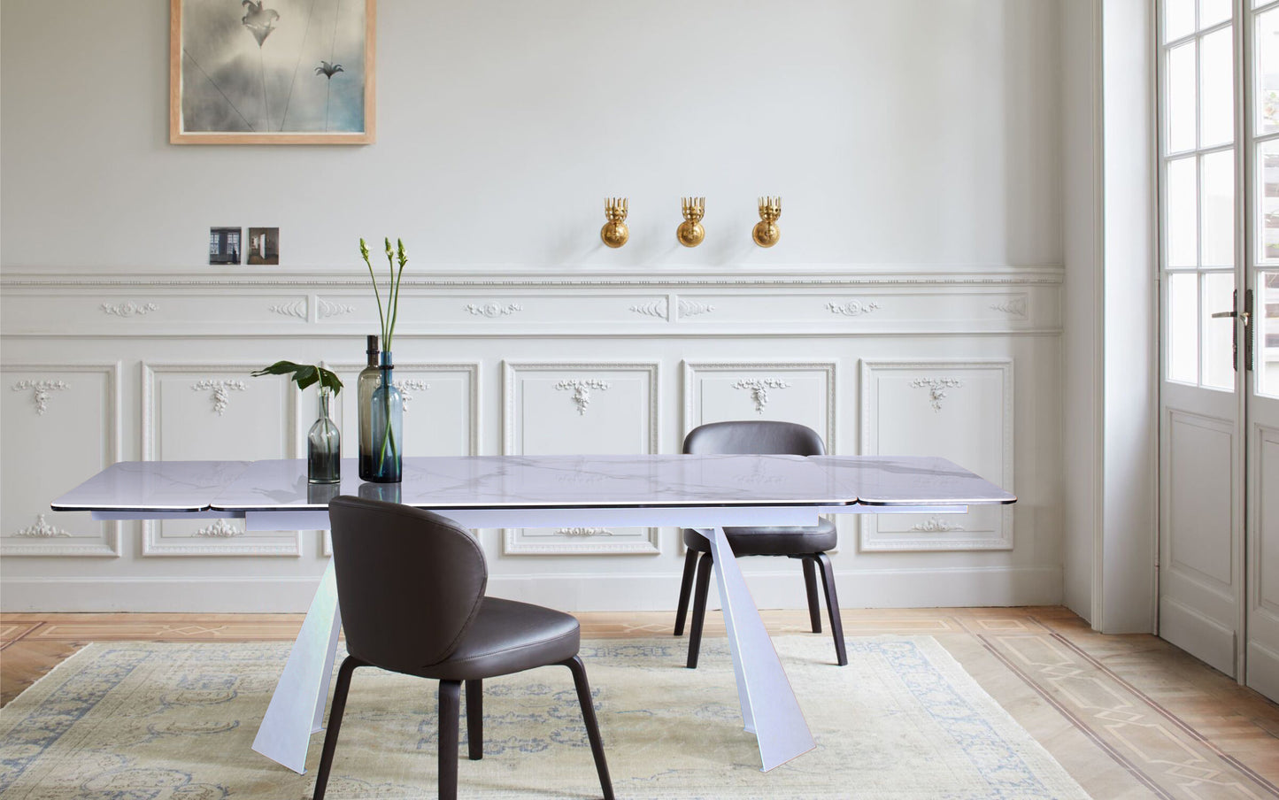 63" White Ceramic and Metal Self-Storing Leaf Pedestal Base Extendable Dining Table