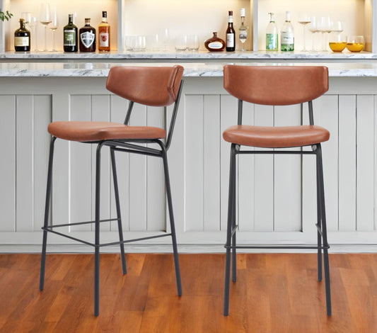 Set of Two 26" Brown And Black Faux Leather And Steel Counter Height Bar Chairs