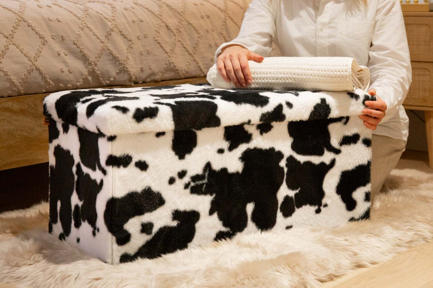 30" Plastic Cow Print Storage Ottoman