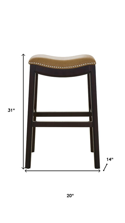 31" Tan and Espresso Faux Leather and Solid Wood Backless Counter Height Bar Chair