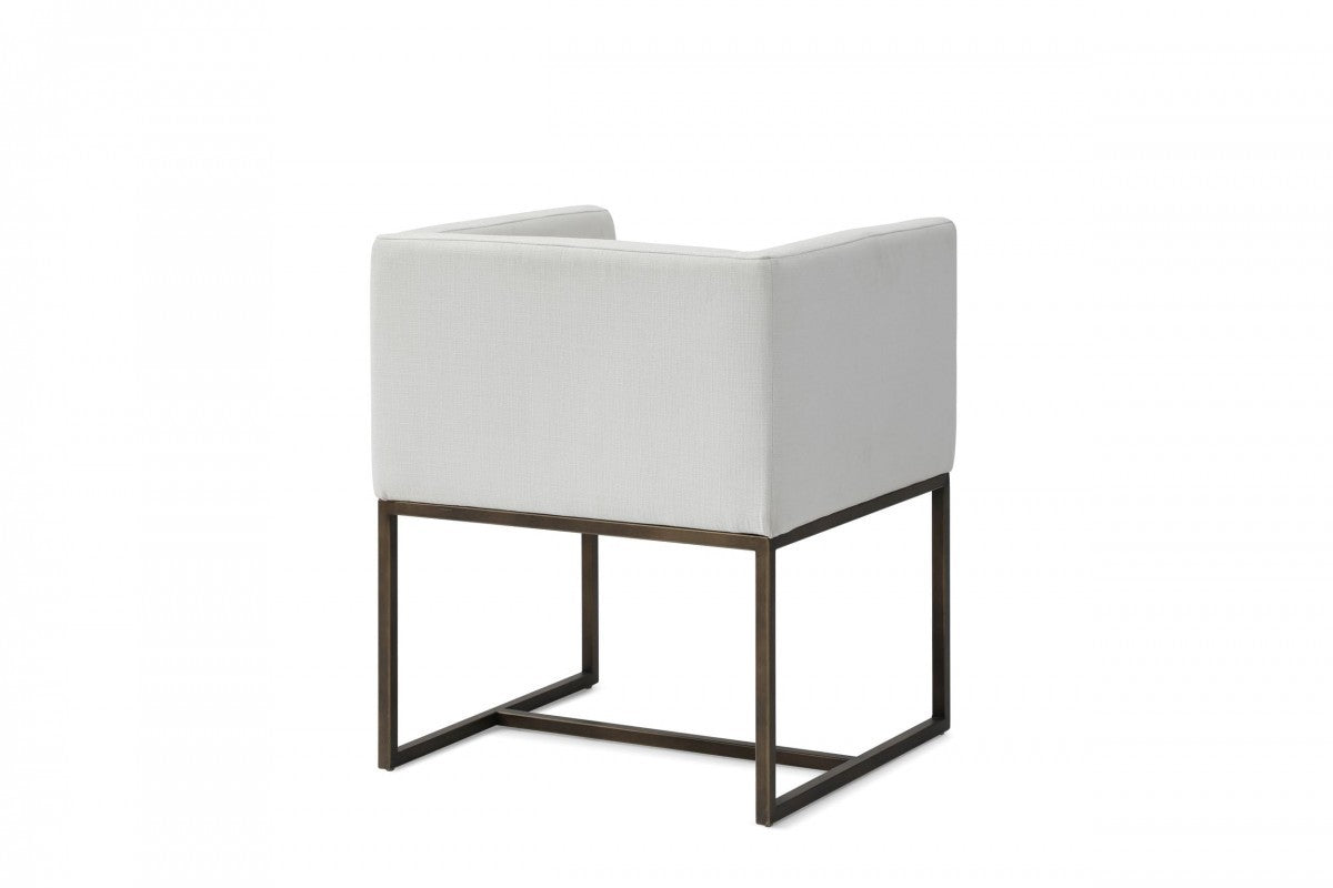 Off White and Antiqued Brass Upholstered Fabric Dining Arm Chair