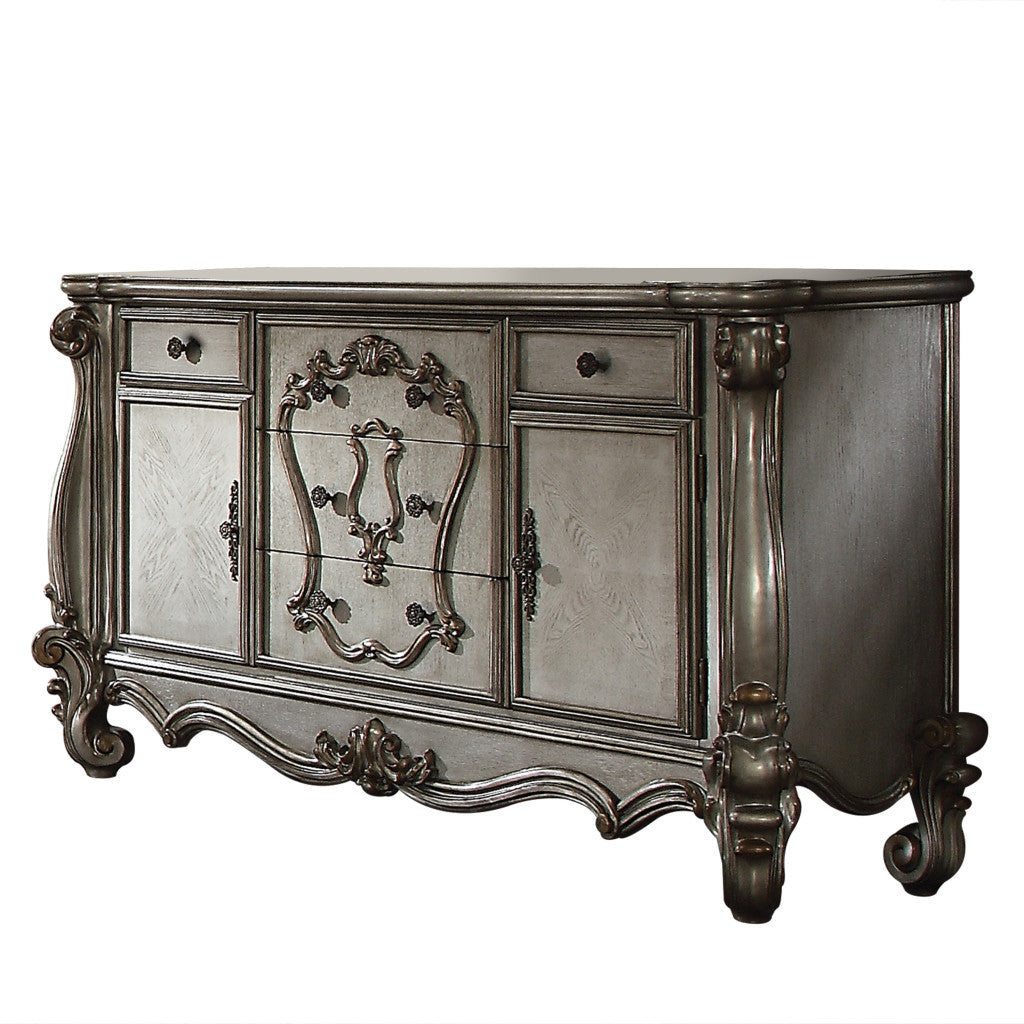70" Platinum Carved Scrollwork Wood And Polyresin Five Drawer Triple Dresser