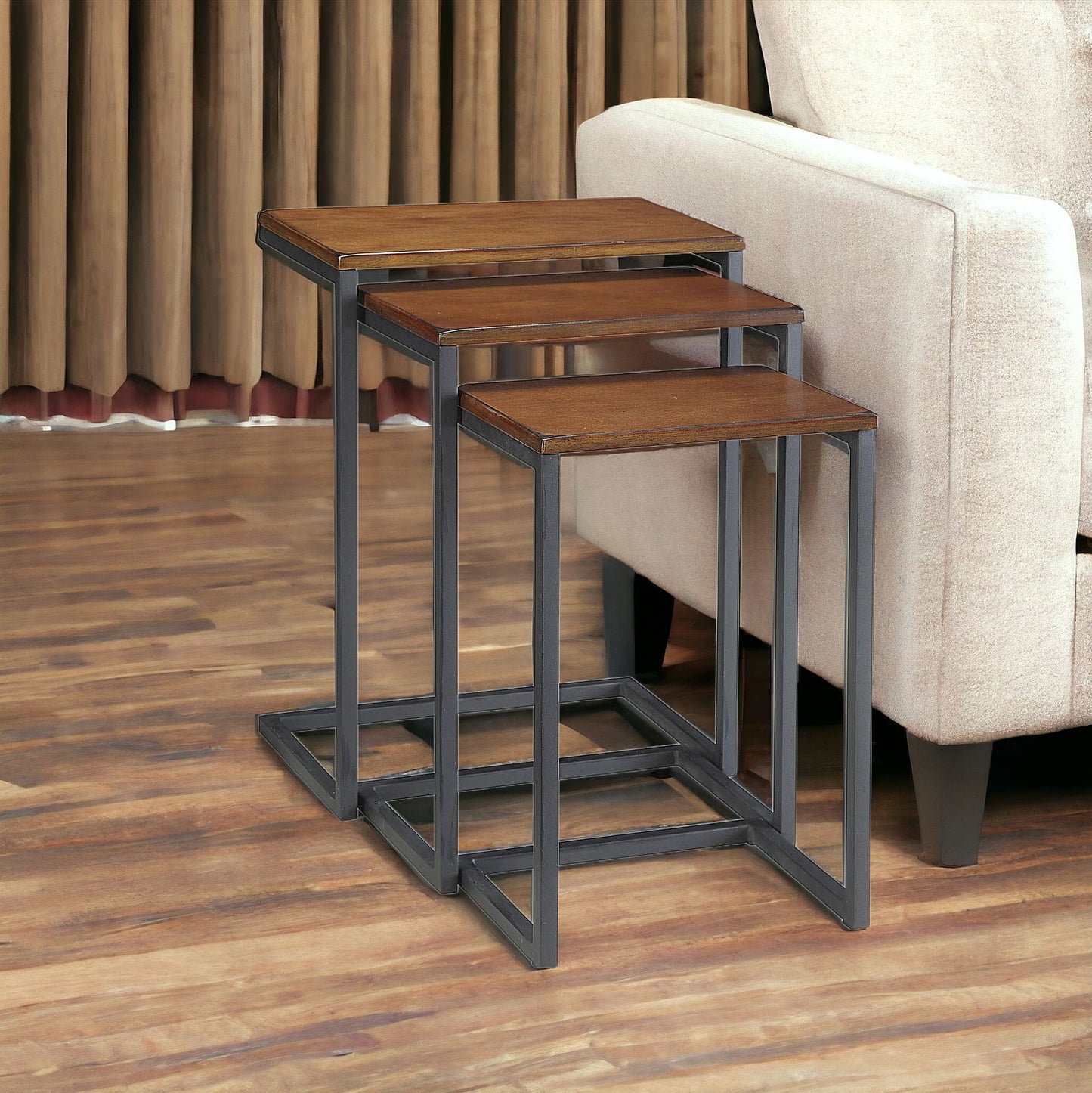 Set of Three Brown and Black Distressed Solid Wood and Metal Frame Nested Tables