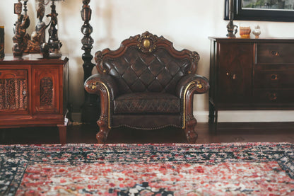 50" Chocolate Faux Leather Tufted Chesterfield Chair And Toss Pillow