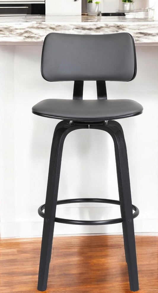 26" Gray And Black Faux Leather Swivel Low Back Counter Height Bar Chair