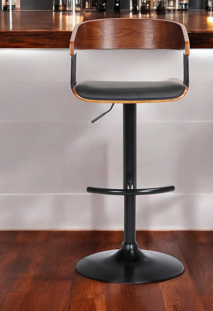 Black Faux Leather And Metal Swivel Adjustable Height Bar Chair