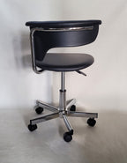Black and Silver Adjustable Height Swivel Rolling Conference Office Chair