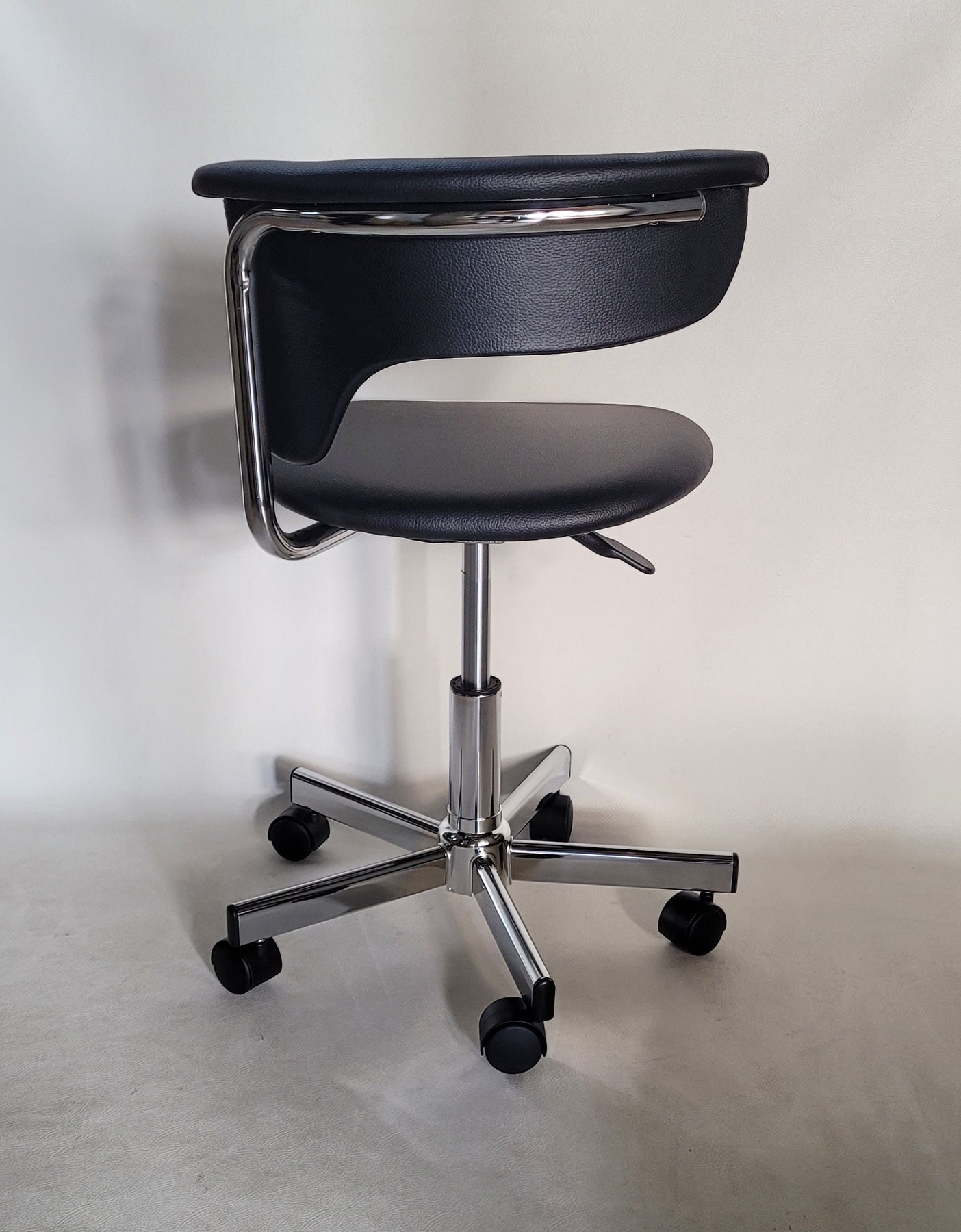 Black and Silver Adjustable Height Swivel Rolling Conference Office Chair