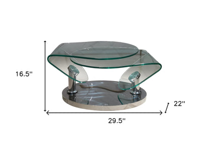 30" Clear And Silver Glass And Metal Oval Abstract Coffee Table