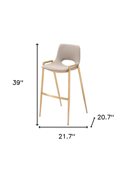 Set of Two 30" Beige And Gold Faux Leather And Steel Low Back Bar Height Bar Chairs