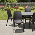 Set of Four Brown Heavy Duty Plastic Outdoor Stacking Dining Chairs