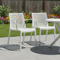 Set of Two White Heavy Duty Plastic Outdoor Stacking Arm Chairs