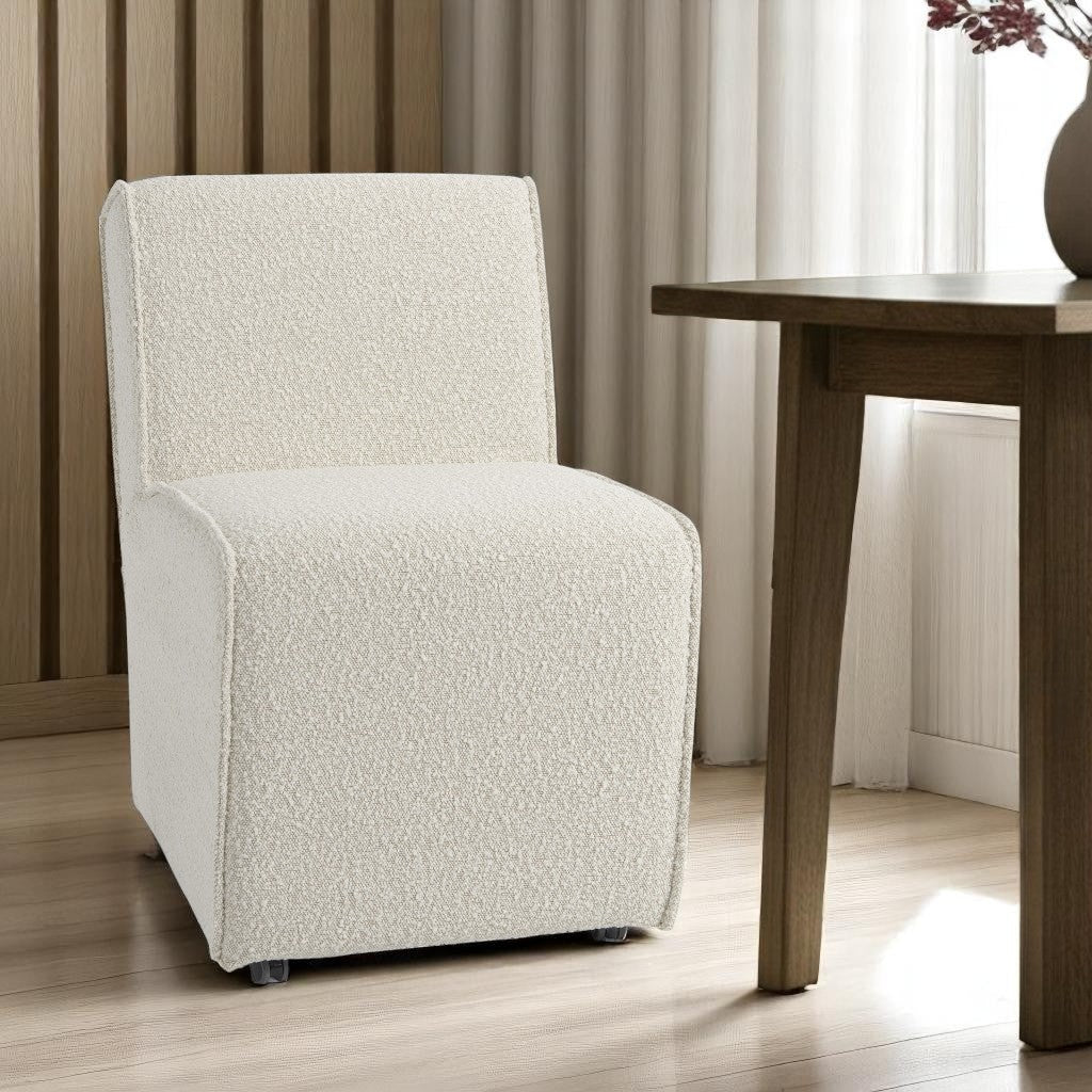 Cream Fully Upholstered Boucle Dining Side Chair With Wheels