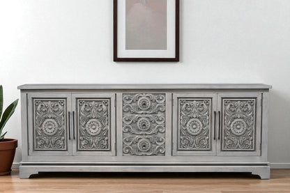 106" Gray Distressed Solid Wood Carved Floral Three Drawer Sideboard with Four Doors