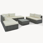 Eight Piece Gray and Beige Wicker Upholstered Cushions Sectional Seating Group With Table