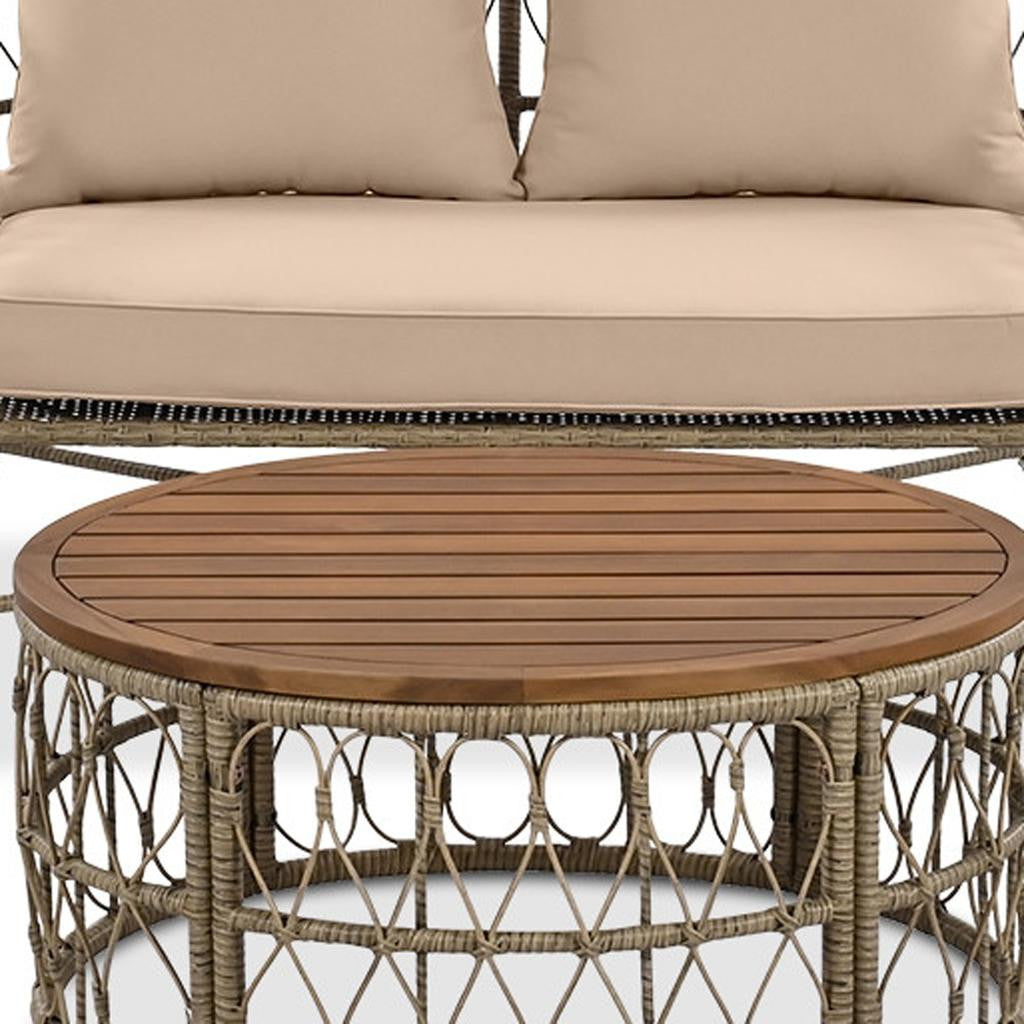 Four Piece Beige and Tan Wicker Upholstered Cushions Sofa Seating Group With Table