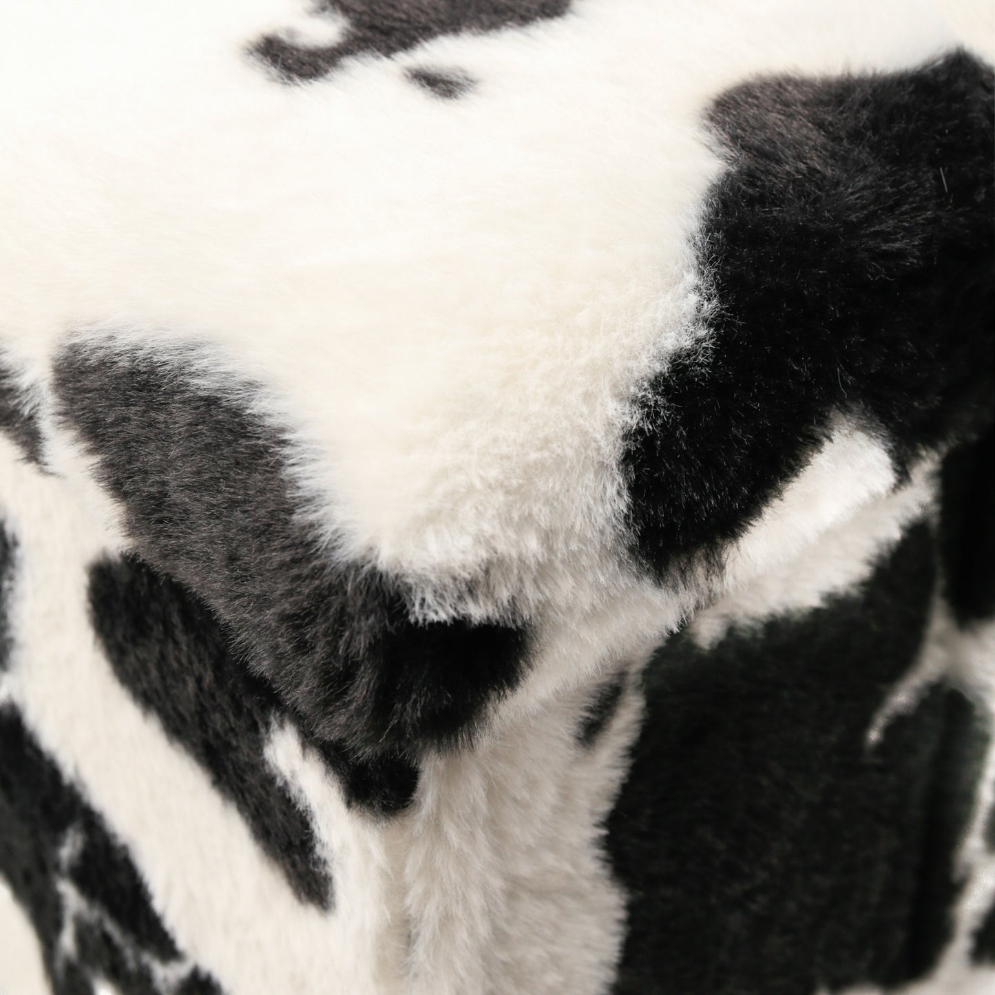 12" Plastic Cow Print Storage Ottoman