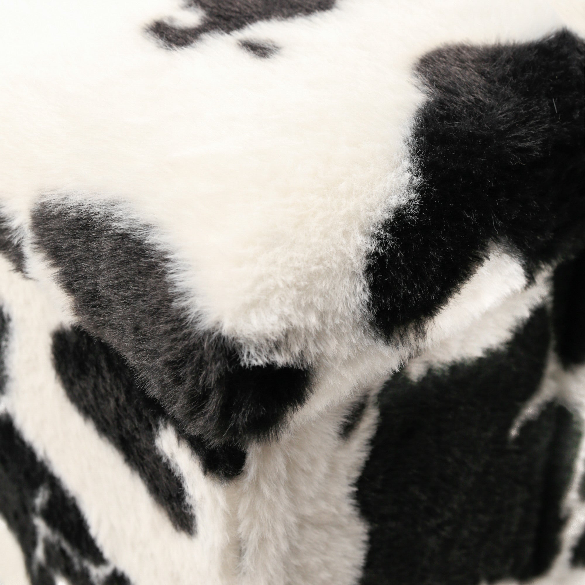 12" Plastic Cow Print Storage Ottoman