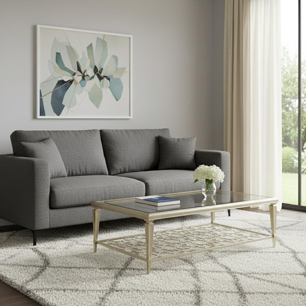 54" Clear and Champagne Glass and Steel Coffee Table