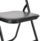 Set of Two Black Faux Leather and Steel Folding Chairs