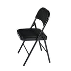 Set of Four Black Faux Leather and Steel Folding Chairs