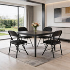 Set of Four Black Faux Leather and Steel Folding Chairs