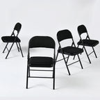 Set of Four Black Faux Leather and Steel Folding Chairs