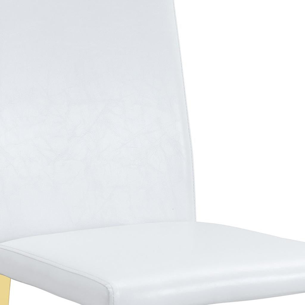 Set of Four White and Gold Faux Leather and Metal Dining Side Chairs