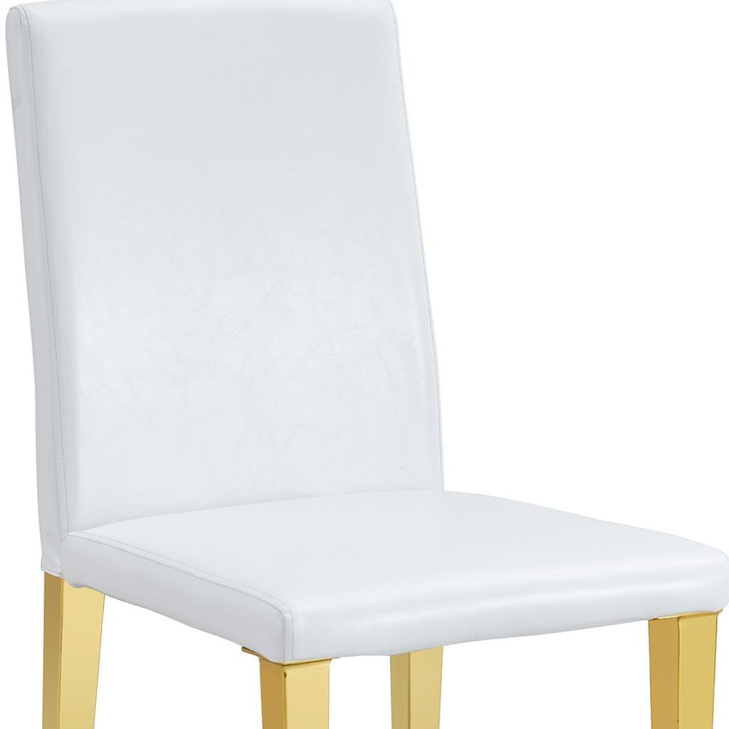 Set of Four White and Gold Faux Leather and Metal Dining Side Chairs