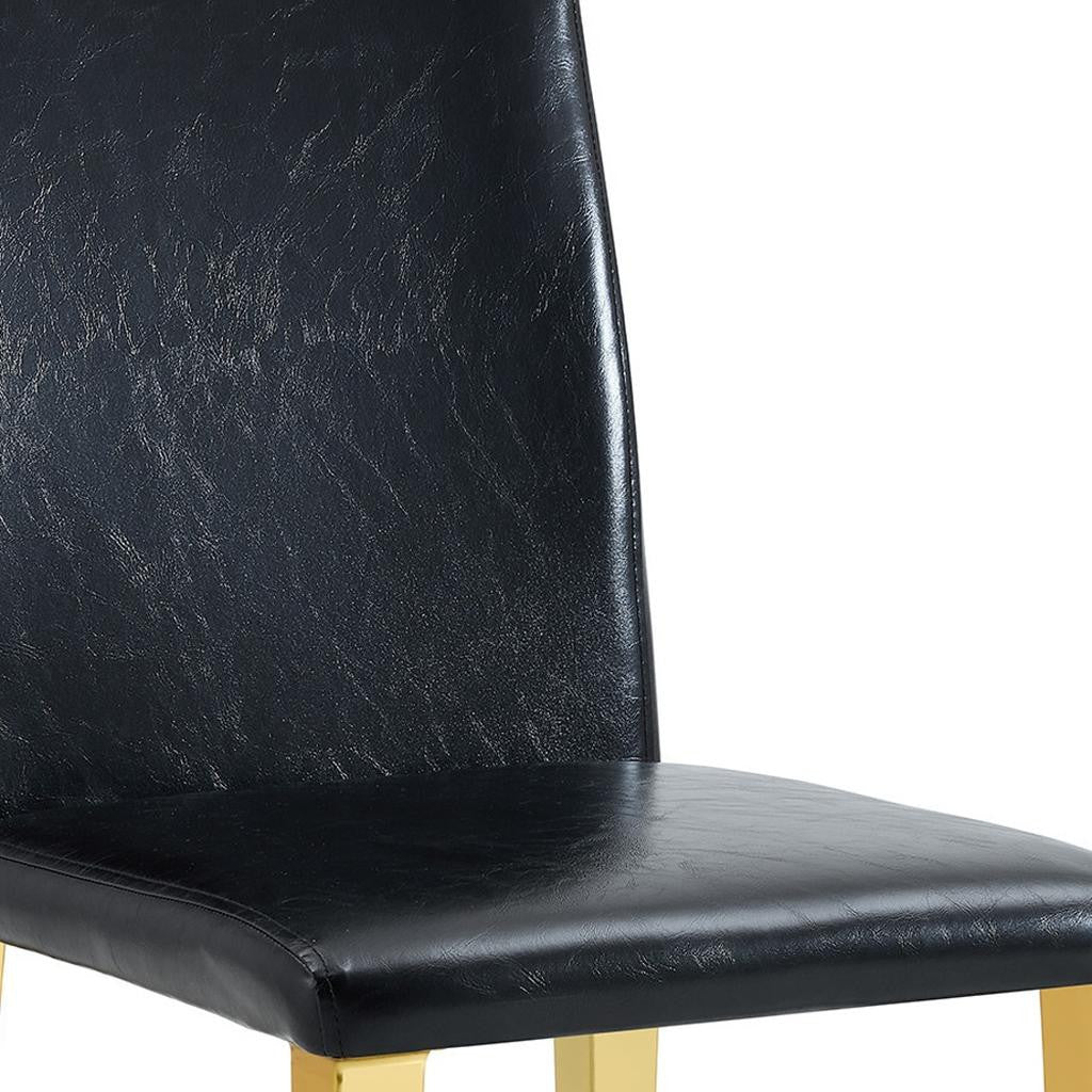 Set of Four Black and Gold Faux Leather and Metal Dining Side Chairs
