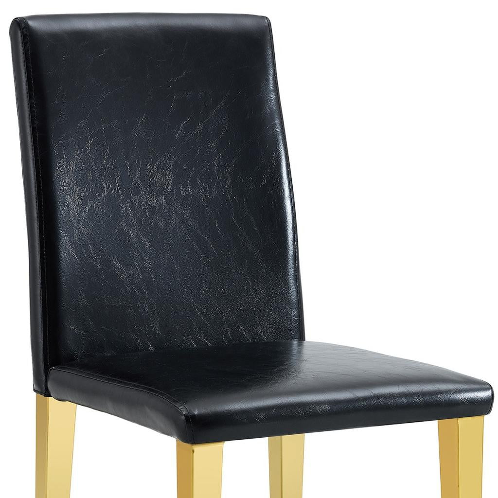 Set of Four Black and Gold Faux Leather and Metal Dining Side Chairs