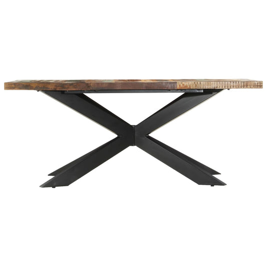 Dining Table Varied wood colors and black legs Reclaimed wood