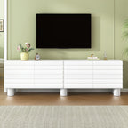 Stylish Thick Wavy Door TV Cabinet With Adjustable Shelves, Cream Style TV Stand With 4 Cabinets For TVs Up To 75, Solid Media Console With Cylindrical Legs And Cable Holes For Living Room, White